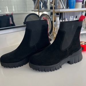 Black Nurture boots.